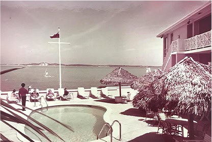 history-img11 - Peace & Plenty Resort, Georgetown, Exuma Beach Rentals Peace & Plenty pool deck circa 1970